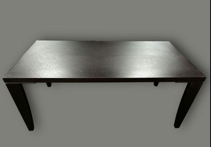 Dark wood dining table with four tapered...