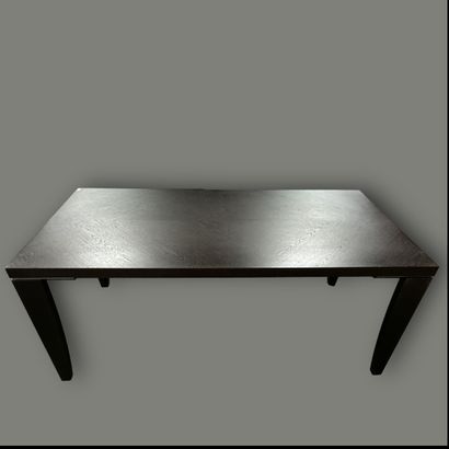 Dark wood dining table with four tapered...