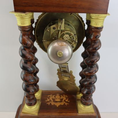 Portico clock with torso column, 19th century....
