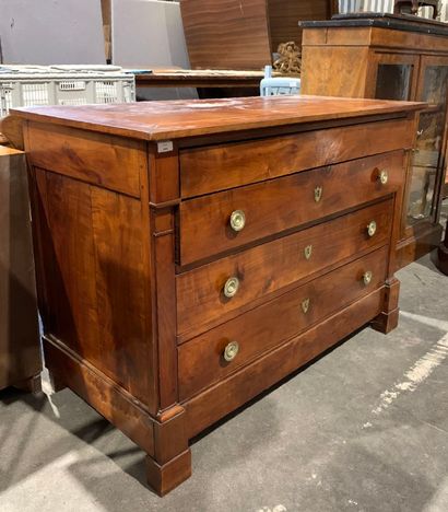 Natural wood chest of drawers opening with...