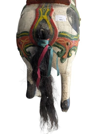 Polychrome wooden carousel horse with a horsehair...
