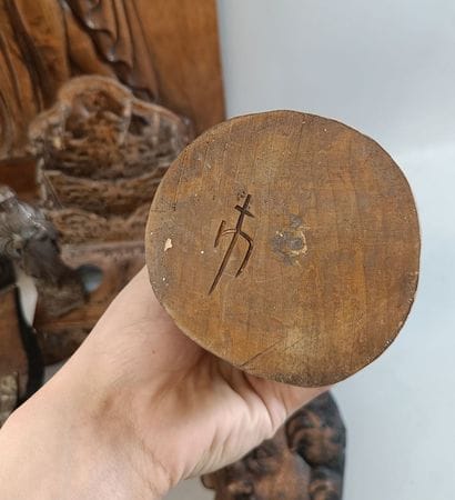 A collection of carved wood and miscellaneous...