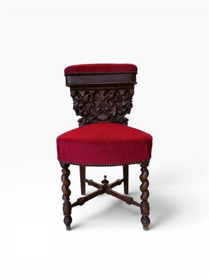 Carved and upholstered wooden chair with...