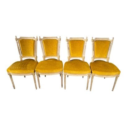 Four Louis XVI-style wooden chairs.
Included...