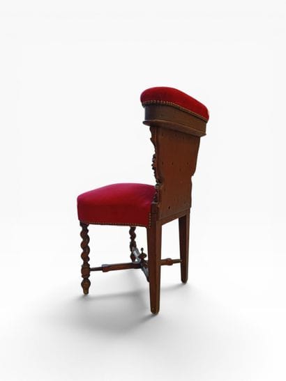 Carved and upholstered wooden chair with...