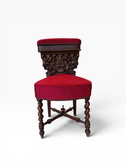 Carved and upholstered wooden chair with...