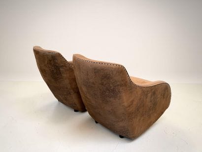 Pair of rocking armchairs in nubuck or stitched...