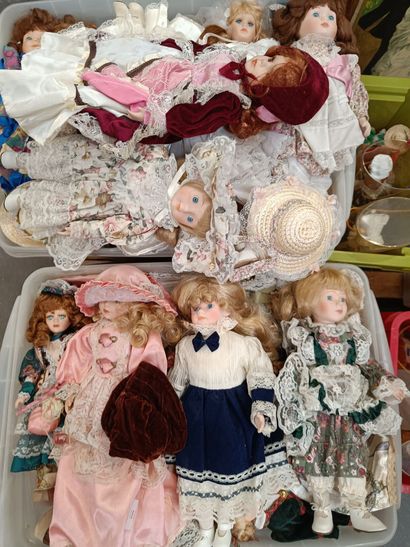 Selection of modern porcelain dolls, celluloid...