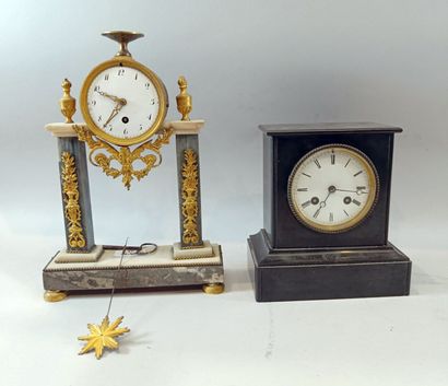 Set of two white and black marble clocks...