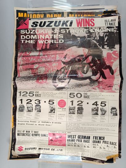 Small collection of posters featuring cars...