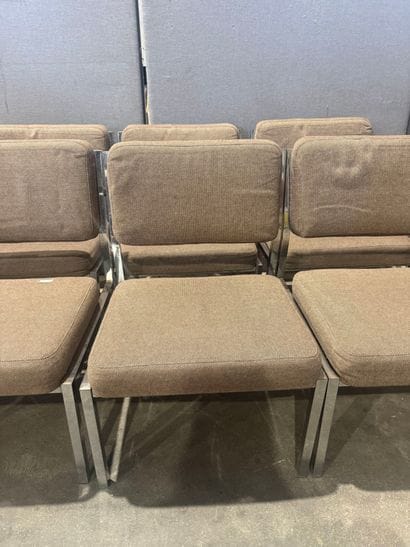 Suite of 12 chrome-plated metal-base armchairs....