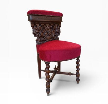 Carved and upholstered wooden chair with...