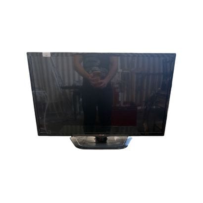 LG TV and its remote control
40x70cm

Please...