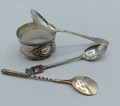 Silver set including:
a silver napkin ring
Minerva...