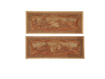Two framed tapestries depicting putti as...