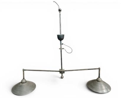 Modern industrial-style metal pendant light...