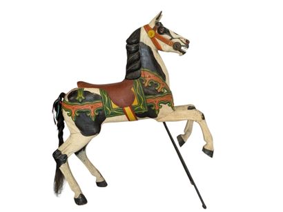 Polychrome wooden carousel horse with a horsehair...
