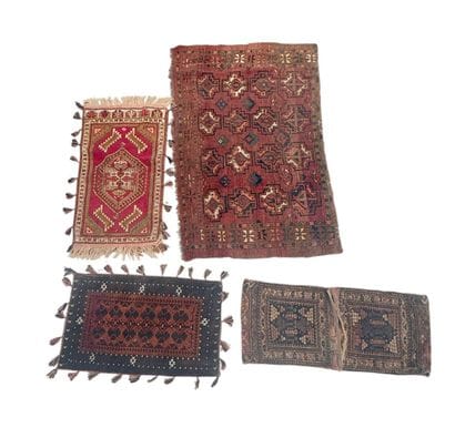 Set of four wool rugs with geometric patterns
ranging...