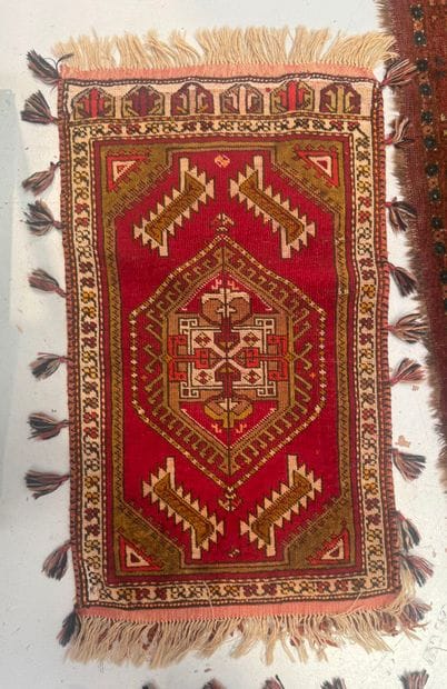 Set of four wool rugs with geometric patterns
ranging...