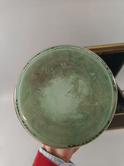 Leather liquor cabinet containing two bottles...