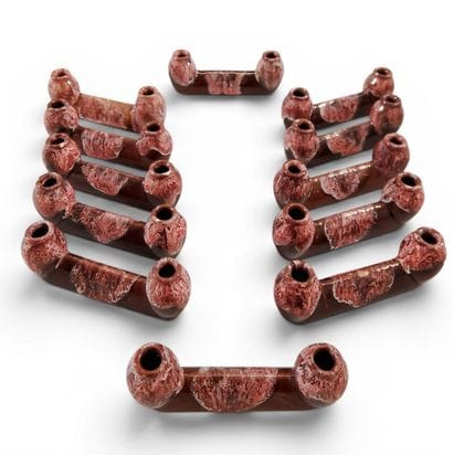 Set of twelve glazed ceramic knife holders
L....