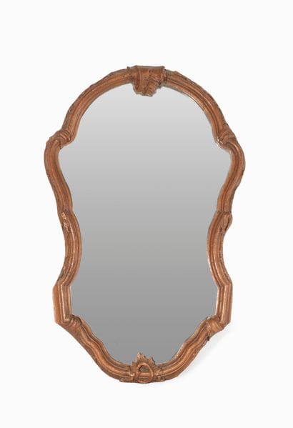 Mirror with a natural wood frame, carved...