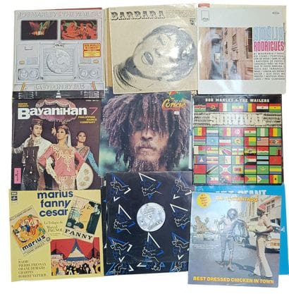 A collection of about sixty vinyl records...