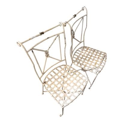 White wrought-iron furniture set, including:
2...