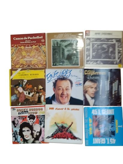 A collection of about sixty vinyl records...