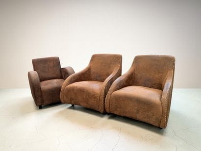 Pair of rocking armchairs in nubuck or stitched...