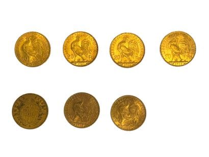 Sept pièces de 20 F en or
Napoléon III tête...