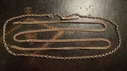 2 fragments de chaines en or jaune (18K)...