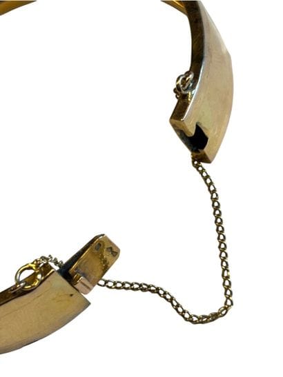 Bracelet jonc en or jaune 18k articulé, et...