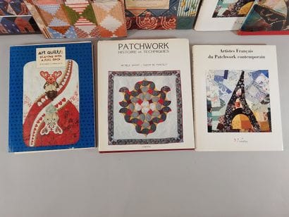 A set of eight paperback books on art quilting...