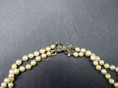 Collier en perles double rangs.
Collier en...