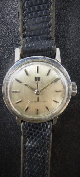 TISSOT. Montre de dame en acier. 