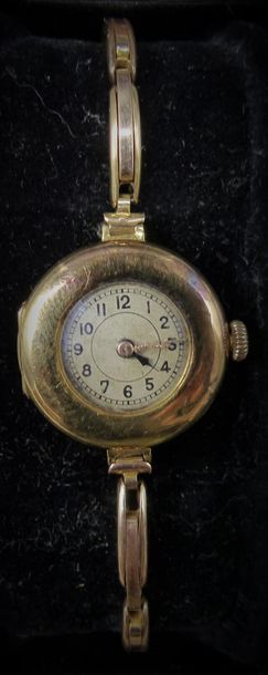 Montre de dame en or 15 carats. poids brut...