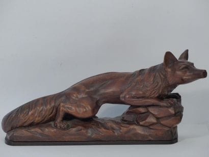 Renard en bois sculpté. Dimensions : 20 x...