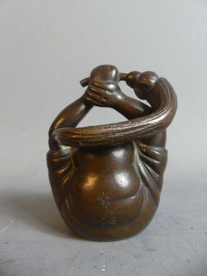 Bronze à patine brune représentant Daruma
JAPON....
