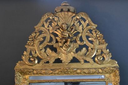 Important miroir à fronton Louis XV.
Important...
