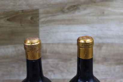 Réunion de 2 bouteilles Château Hanteillan,...