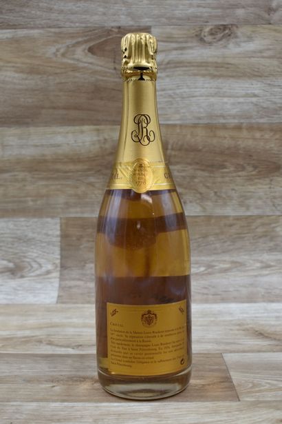 Une bouteille de champagne Cristal millésimé,...