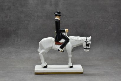 ROBJ PARIS. Cavalier en faïence polychrome...