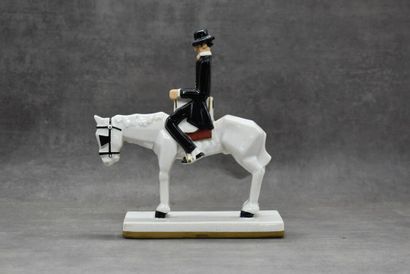 ROBJ PARIS. Cavalier en faïence polychrome...