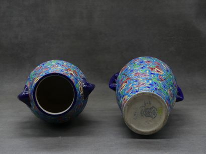 LONGWY. Paire de vase en céramique polychrome...