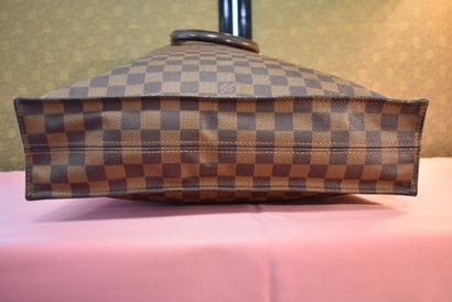 LOUIS VUITTON. Flat bag in checkerboard canvas...