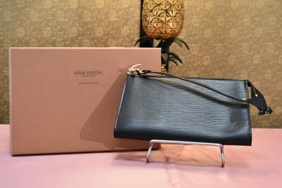 LOUIS VUITTON. Leather accessory pouch, with...