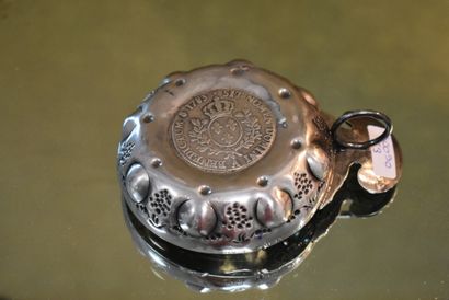 Silver wine tasting vessel with grapes and...