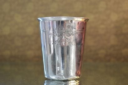 A minerva silver tumbler decorated with knotted...