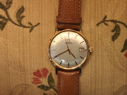 OMEGA. Men's automatic watch with gold case...